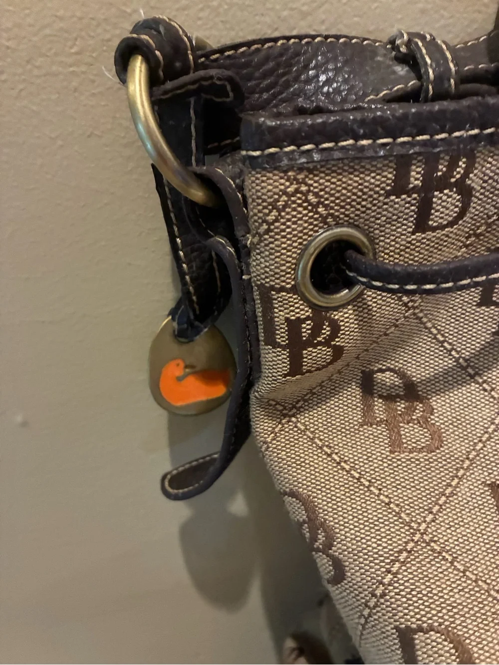 Dooney & Bourke Tan Monogram Drawstring Shoulder Bag